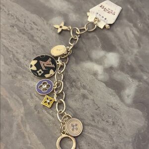 Rebecca Gold and Purple Charm Bracelet